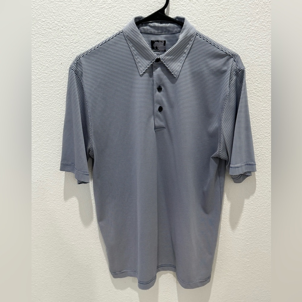 Greg Norman golf polo.  Size Medium.
